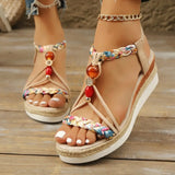 dames sandalen met jute zool en kleurrijke accenten
