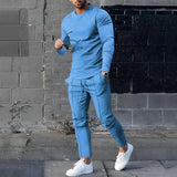 blauwe mannen trainingsset met lange mouwen en smalle broek