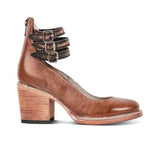 Donkerbruine hakken met leren look en bandjes