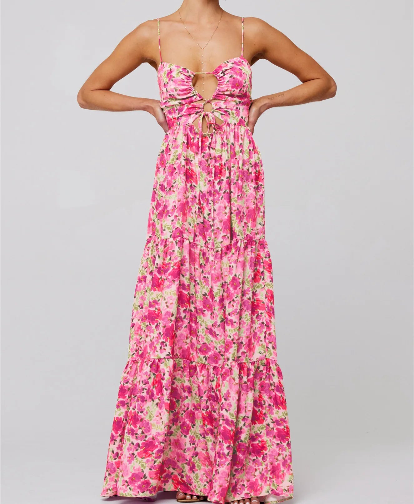 Zachte pastelkleurige strapless jurk met roze bloemen