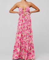 Zachte pastelkleurige strapless jurk met roze bloemen