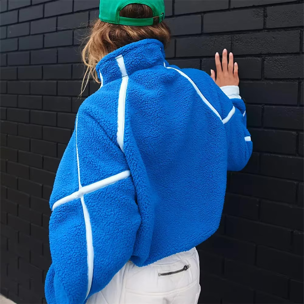 Blauwe half-zip sweater met verstelbare zijkoorden, vooraanzicht.