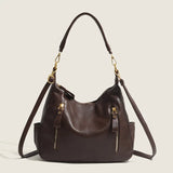 bruine leren hobo tas met vintage uitstraling en soepele structuur
