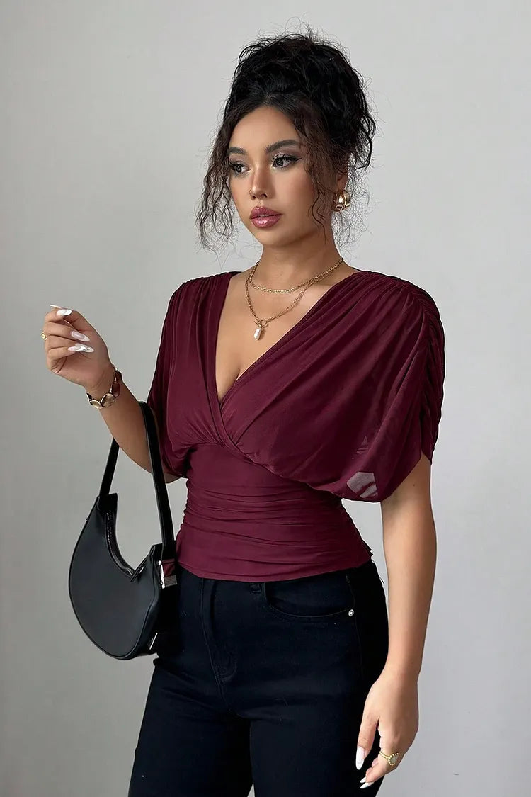 Celestine Bluse Damen seitliche Ansicht mit drapierten Ärmeln