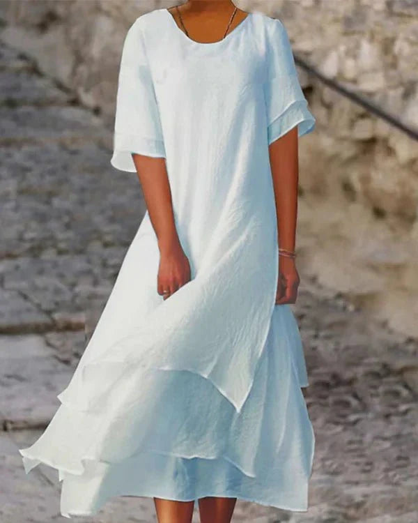 Ademend katoenen zomerjurk met elegante pasvorm
