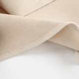 Stoffdetail Dalara Mantel, weiche Struktur
