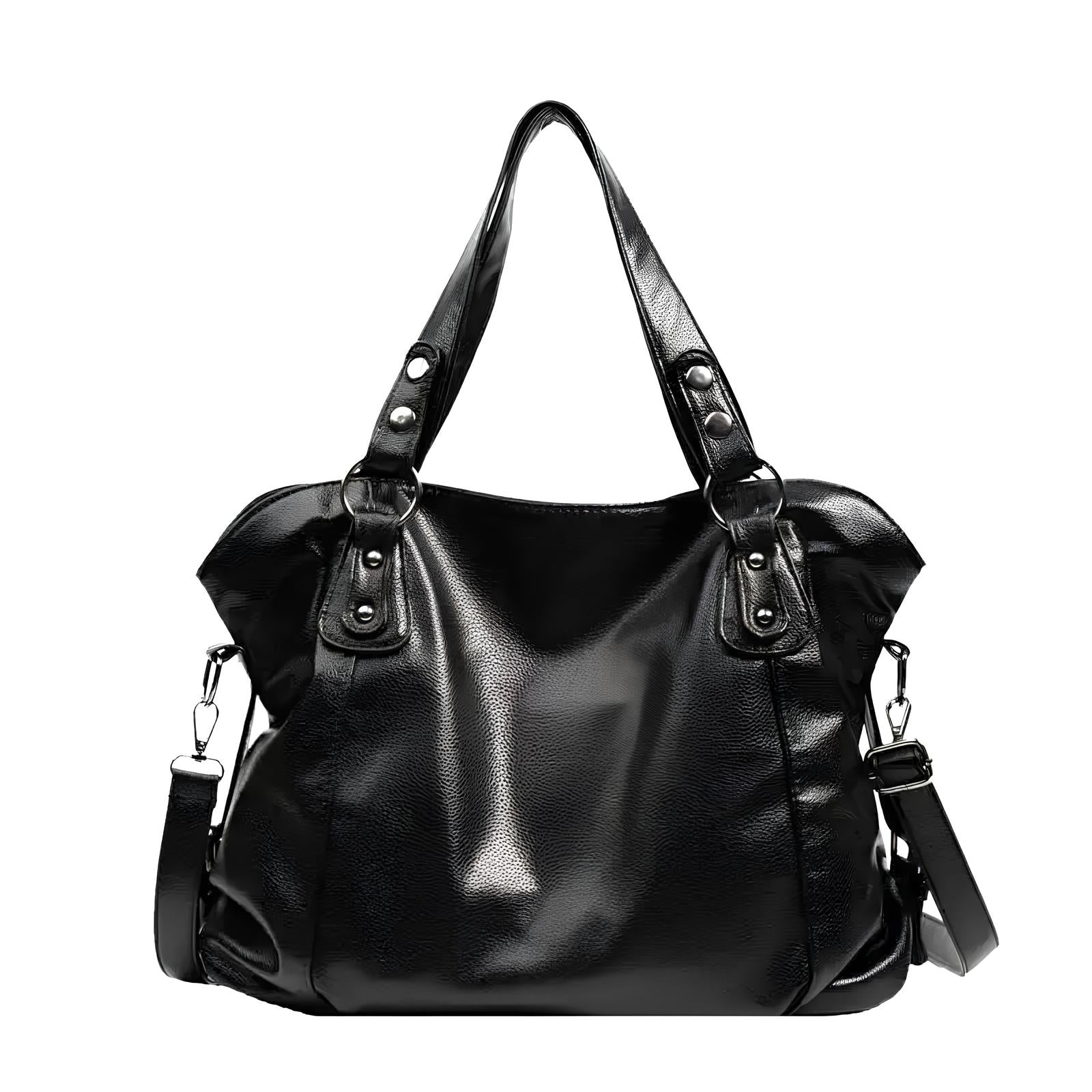 close-up van zwarte grote damestas met luxe afwerking en metalen details