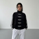 Yúmei Track Jacket | Retro-Sportjacke mit Knopfdetails mit Schlaufen