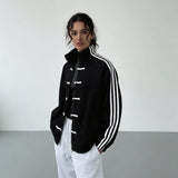 Yúmei Track Jacket | Retro-Sportjacke mit Knopfdetails mit Schlaufen