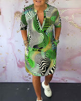 elegante midi-jurk met slanke pasvorm en kleurrijke print

