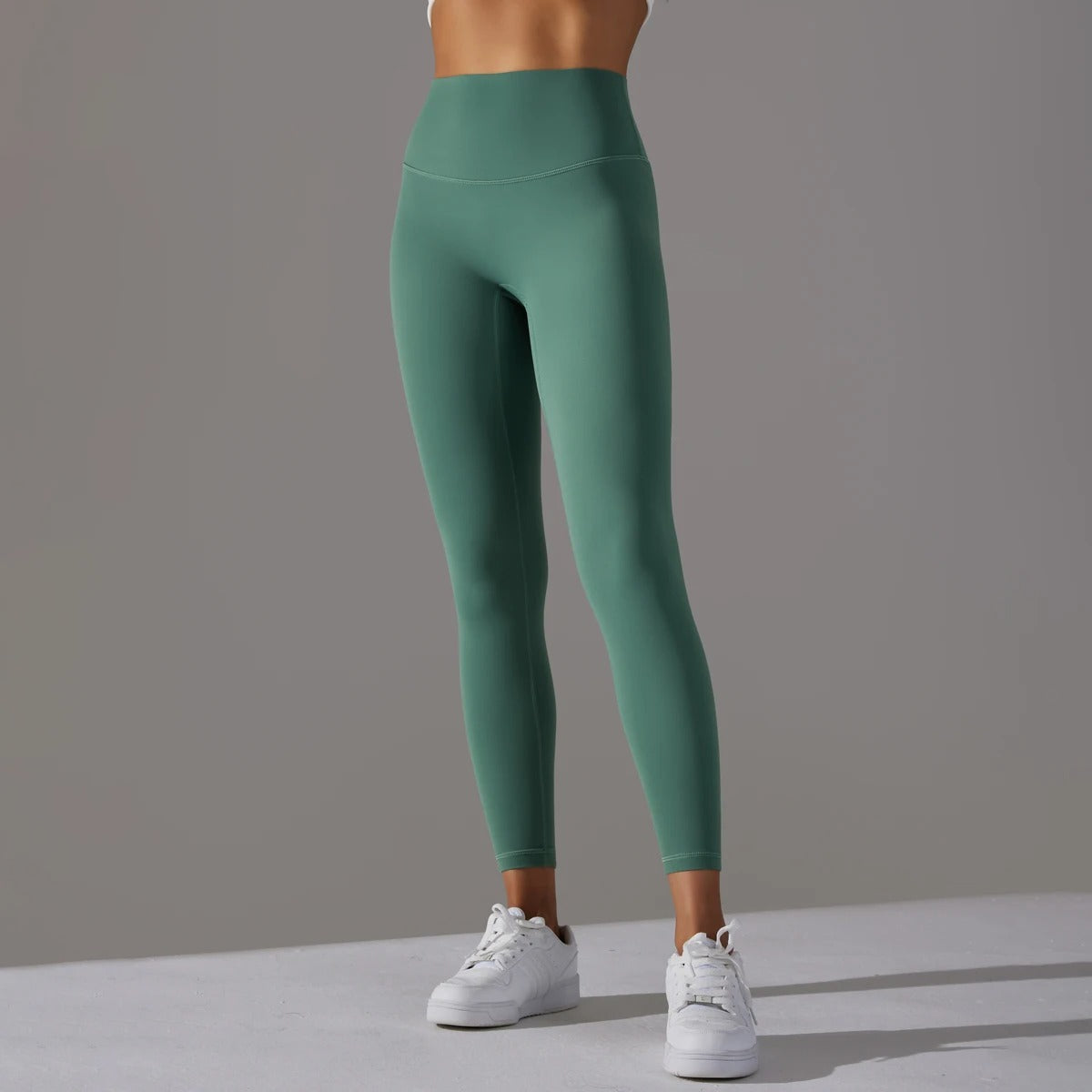 Leggings Damen in Smaragdgrün, hoher Bund, figurformend
