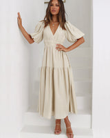 Elegante jurk met pofmouwen
