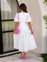 Elegante jurk met pofmouwen
